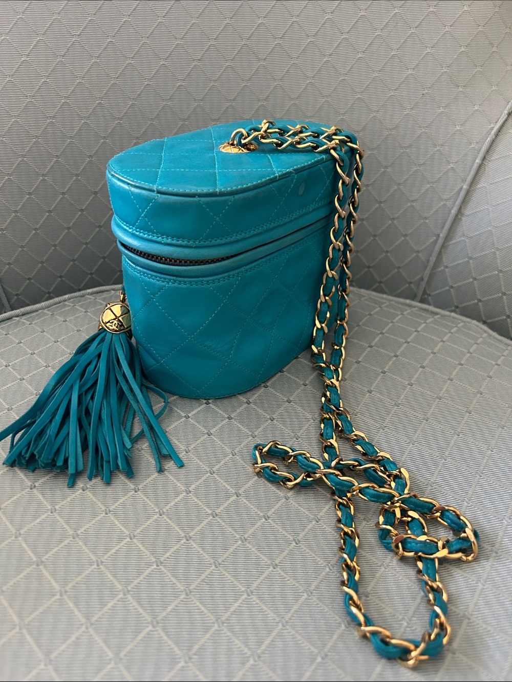 CHANEL Teal Quilted Round Tassel Crossbody